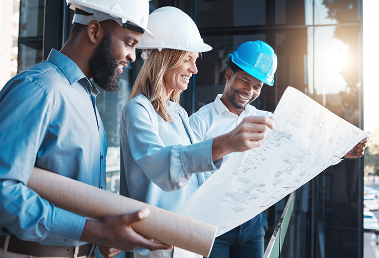 Architecture, construction building with an architect, engineer and designer working as a team and reading a blueprint. Teamwork, collaboration and development with a group of creative staff