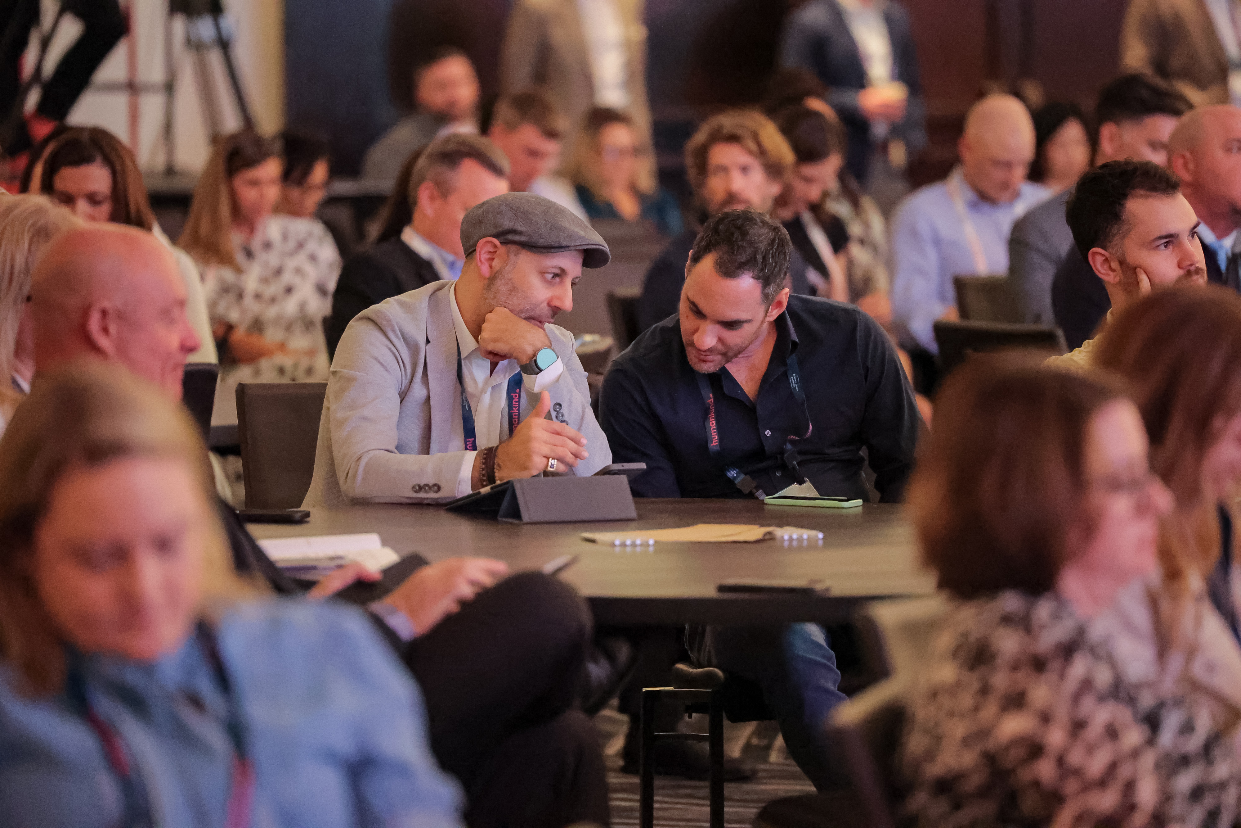 People talking at 2025 conference