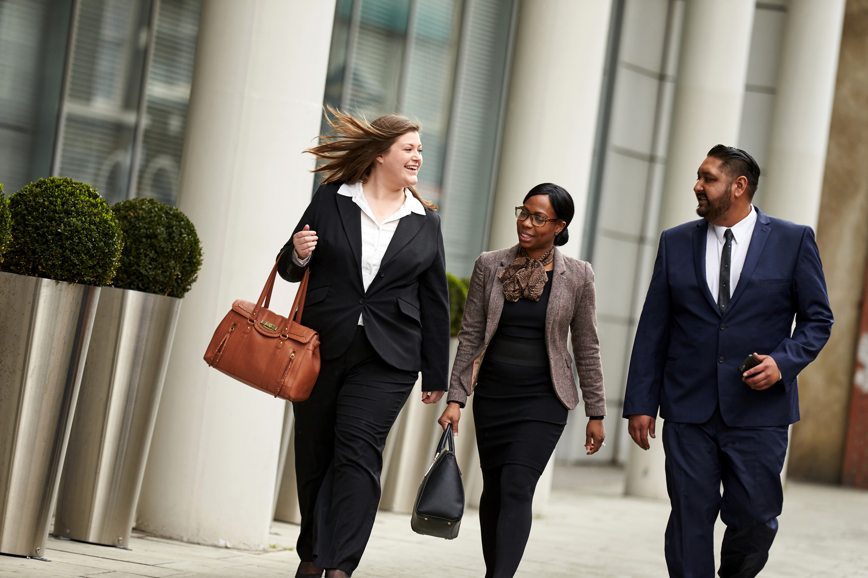 Walking in Business Suits